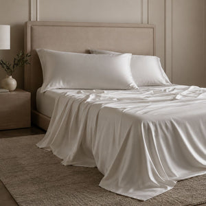 Are satin sheets effective for cooling, and what determines their cooling properties?